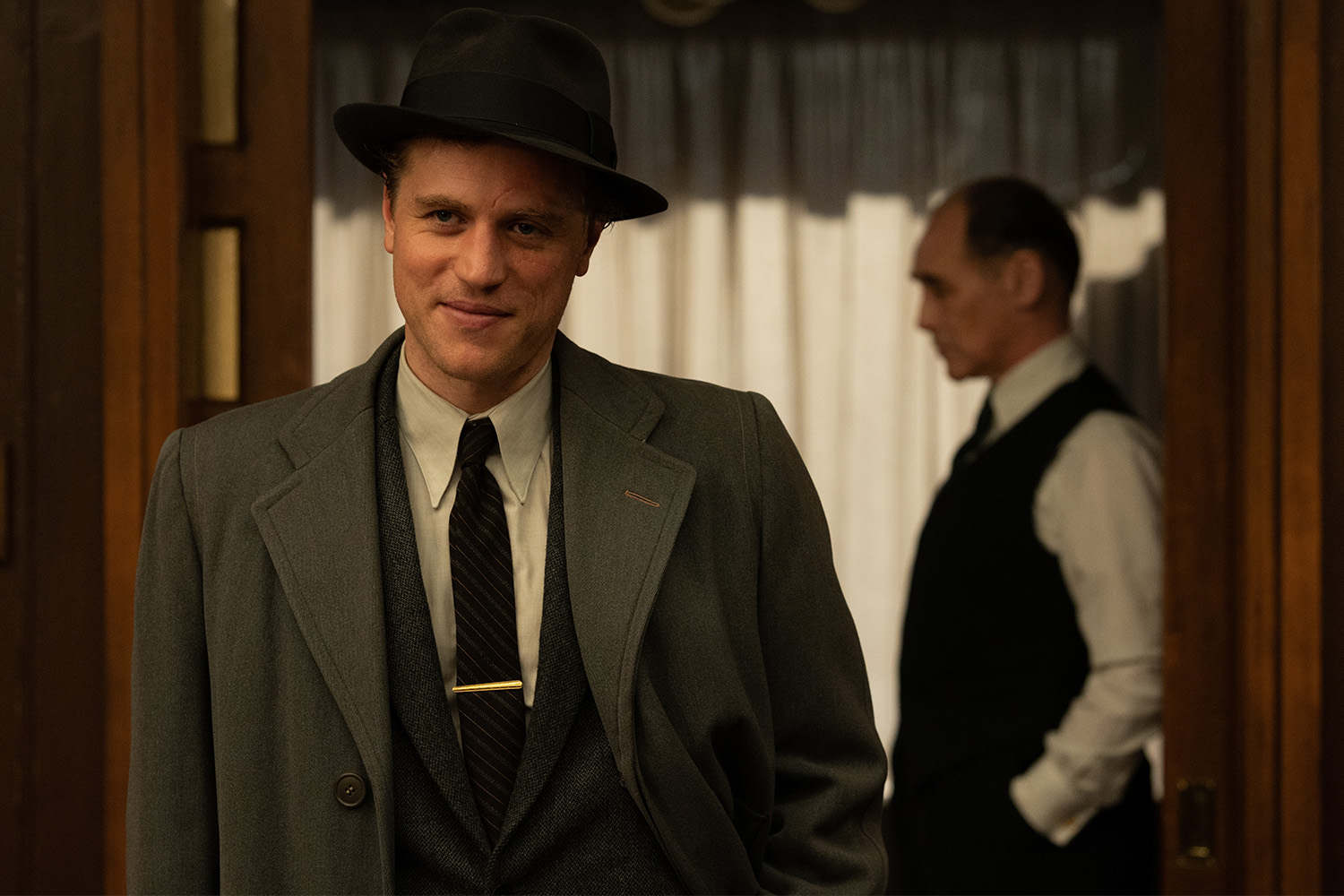 Johnny Flynn (left) stars as "Francis" and Mark Rylance (right) stars as "Leonard" in director Graham Moore's THE OUTFIT, a Focus Features release.