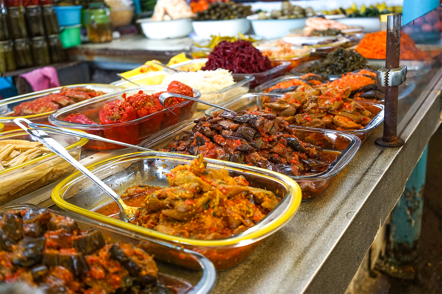 Yalta, Crimea. Products of the Yalta market, pickles of vegetables on the counter for sale.