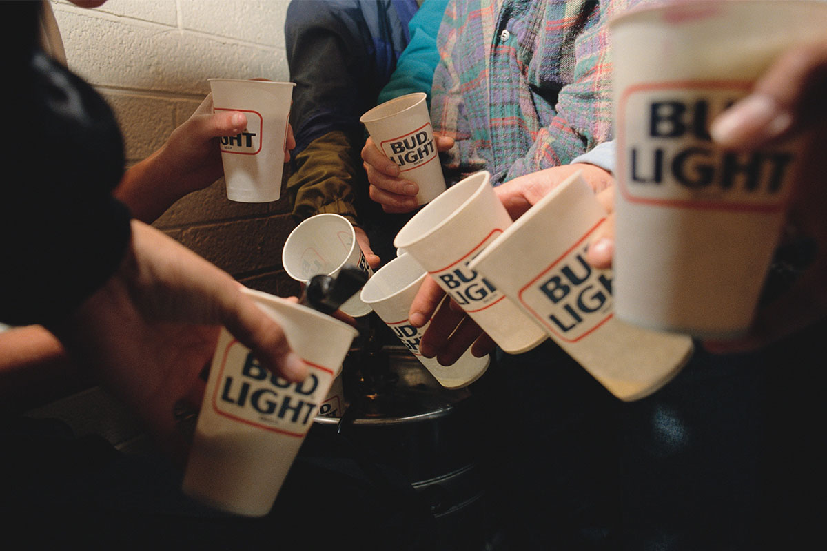 A group of coeds drinking beers. A new study using rats showed that scientists may eventually be able to erase the effects of binge drinking in adults after teen alcohol consumption.