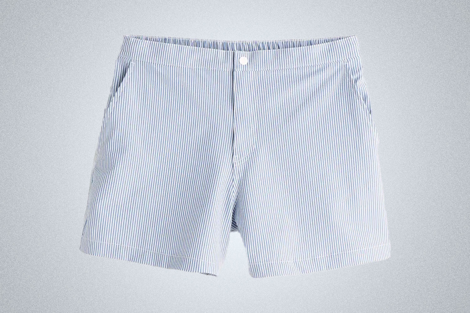 a blue striped swim trunk on a grey background