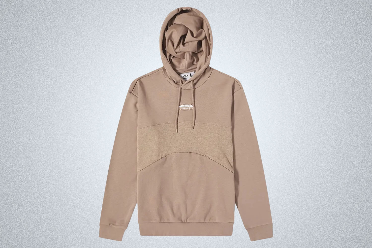 a tan-biege hoodie on a grey background