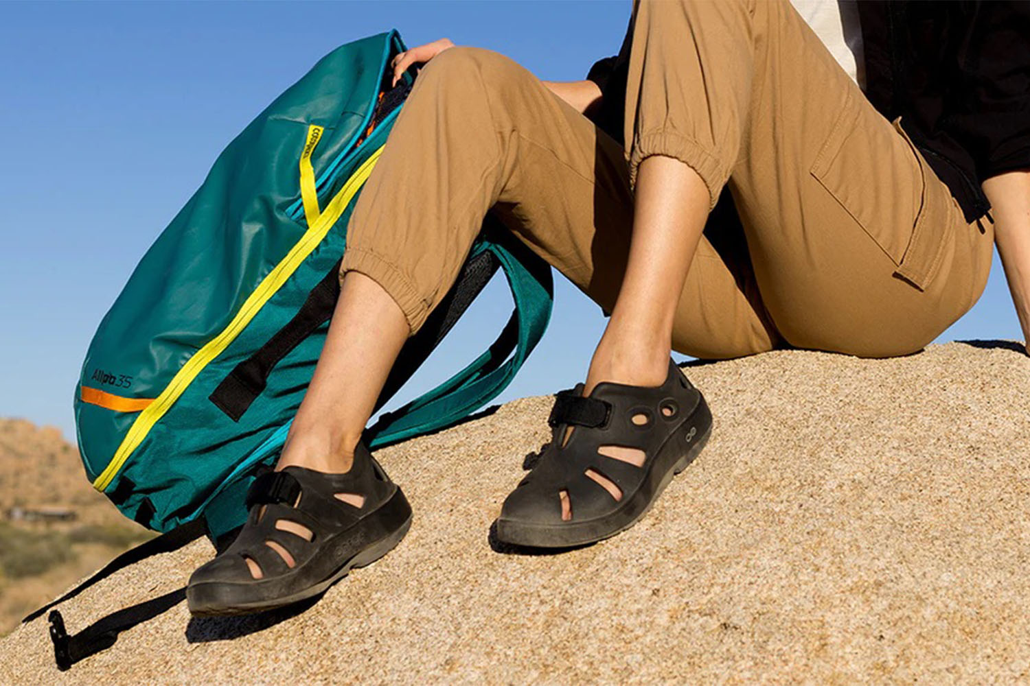 a model wearing OOcandoo shoes 