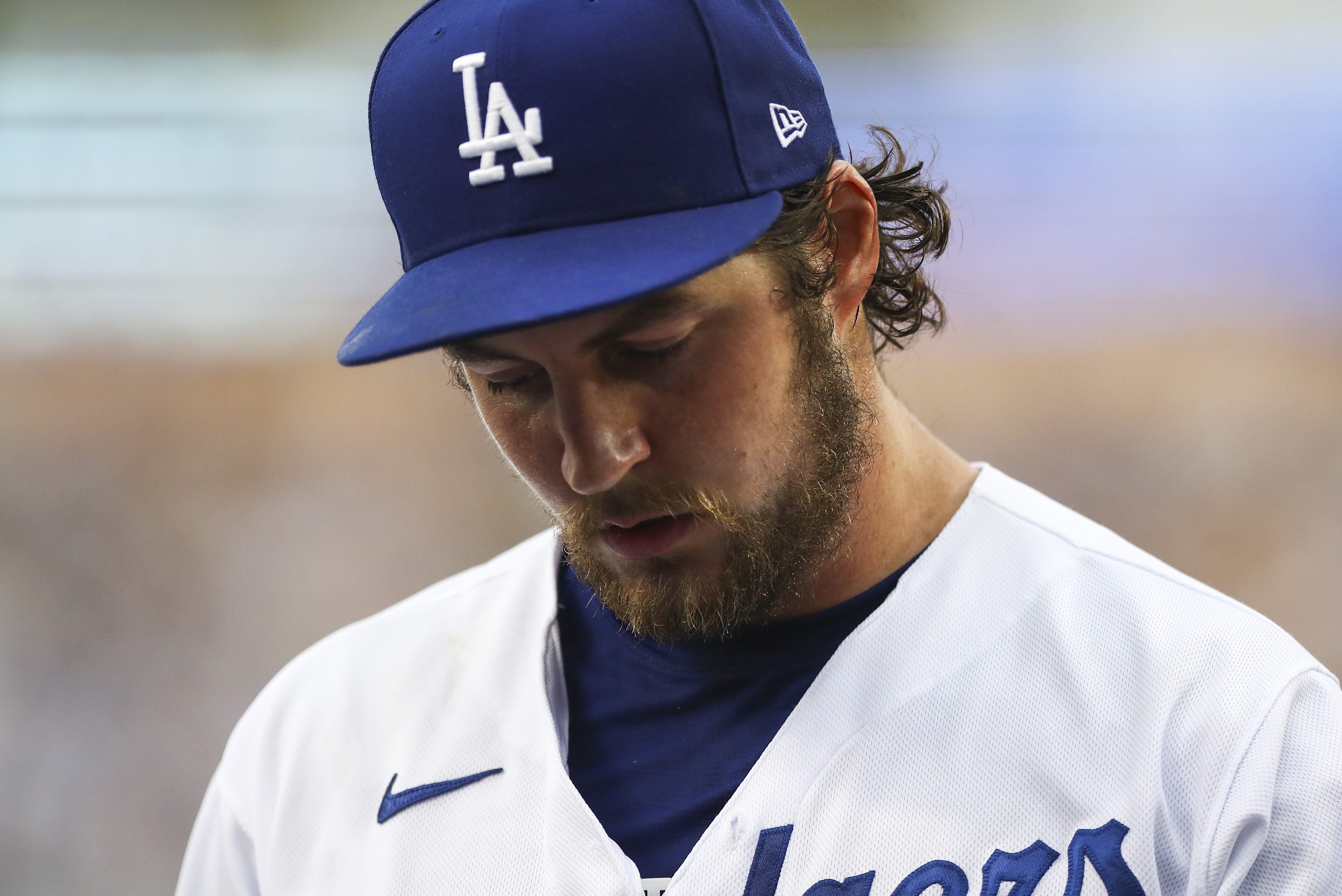 Trevor Bauer of the Los Angeles Dodgers returns to the dugout in 2021