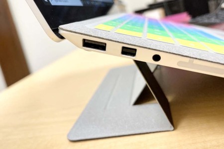 A close-up of the MOFT Invisible Laptop Stand on a computer