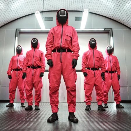 Guards dressed in pink in a scene from Netflix's Squid Game