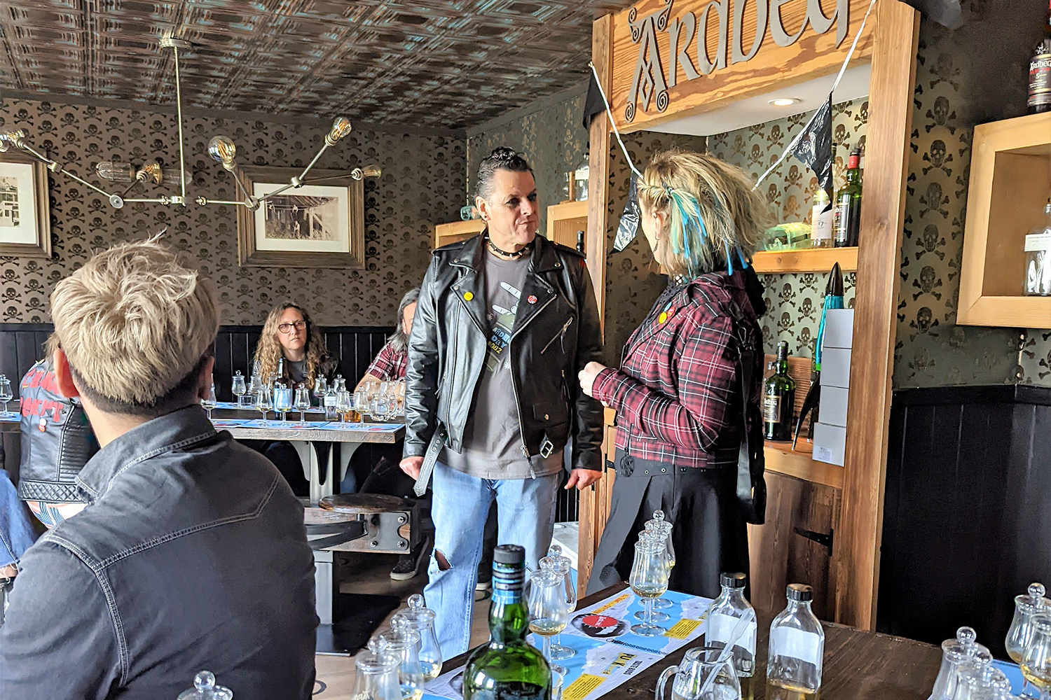 Bill Lumsden and Gillian Macdonald of Ardbeg distillery in punk themed costumes for Ardbeg Day 2022