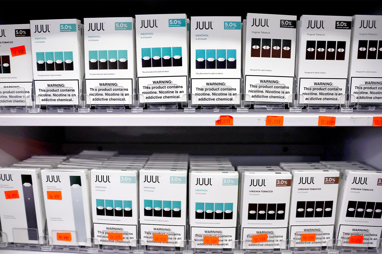 Packages of Juul e-cigarettes are displayed for sale in the Brazil Outlet shop on June 22, 2022 in Los Angeles, California.