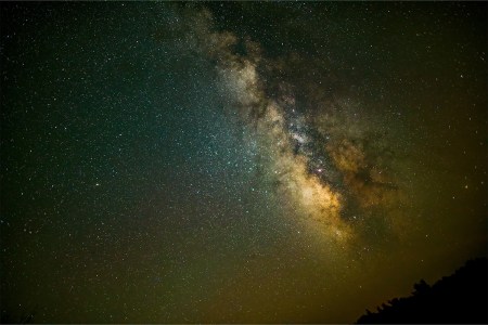 A low angle view of stars in the sky at night as seen from Copper Breaks State Park in Texas