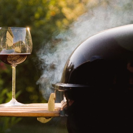 Wine glass next to BBQ