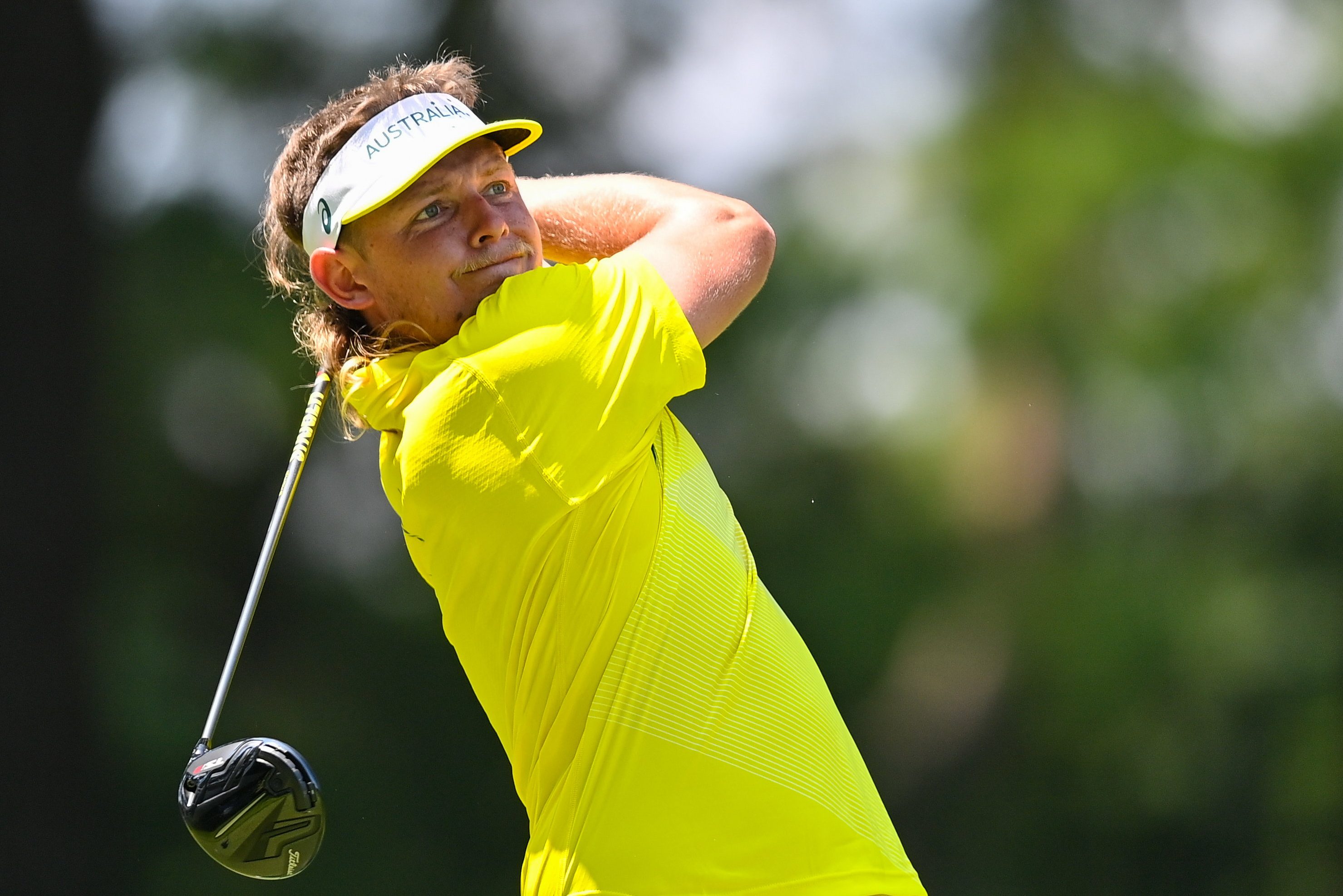 Cameron Smith of Australia plays his tee shot on the fifth hole during round 4 of the men's individual stroke play at the Kasumigaseki Country Club during the 2020 Tokyo Summer Olympic Games.