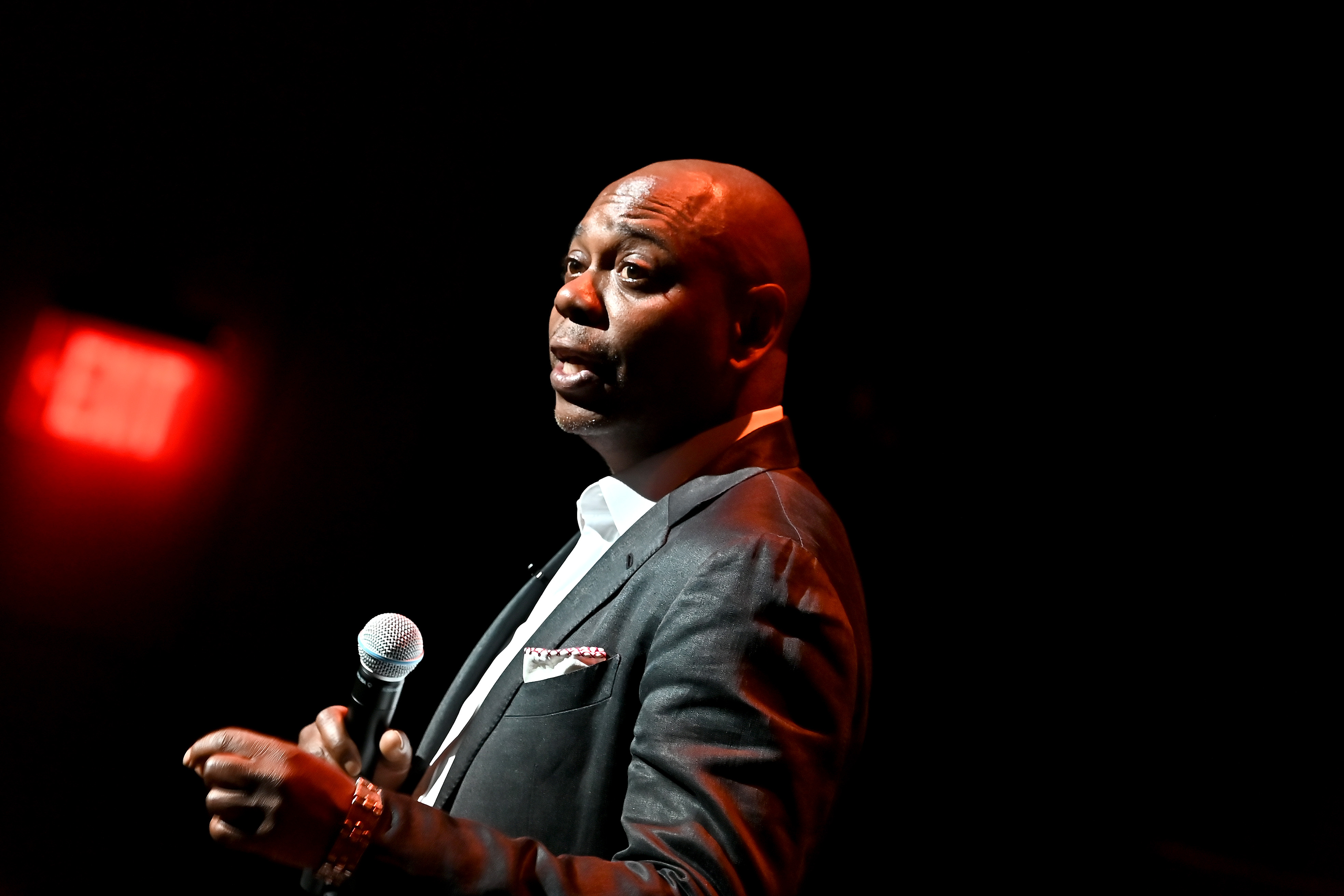 Dave Chappelle performs onstage during the Dave Chappelle theatre dedication ceremony at Duke Ellington School of the Arts on June 20, 2022 in Washington, DC.