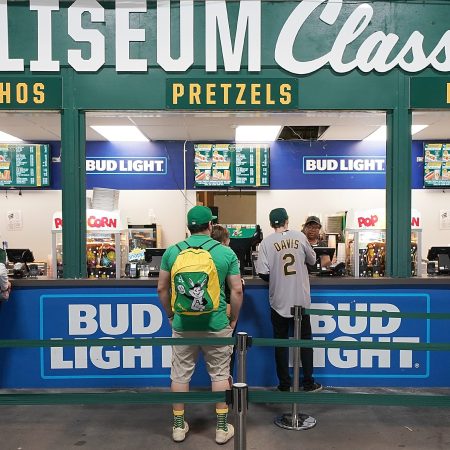 Fans purchasing food from concession stands on Opening Day at Oakland-Alameda County Coliseum