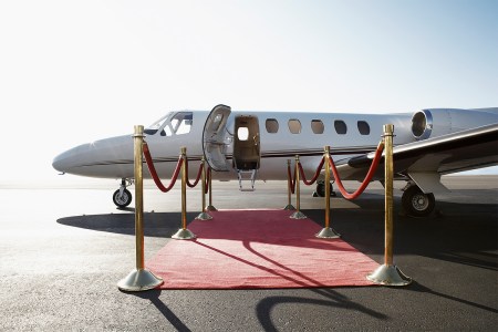 Private airplane with red carpet