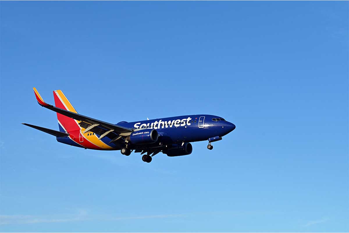 A Southwest Airlines plane approaches the runway at Ronald Reagan Washington National Airport (DCA) in Arlington, Virginia, on April 2, 2022. Southwest just announced flight credits will never expire.