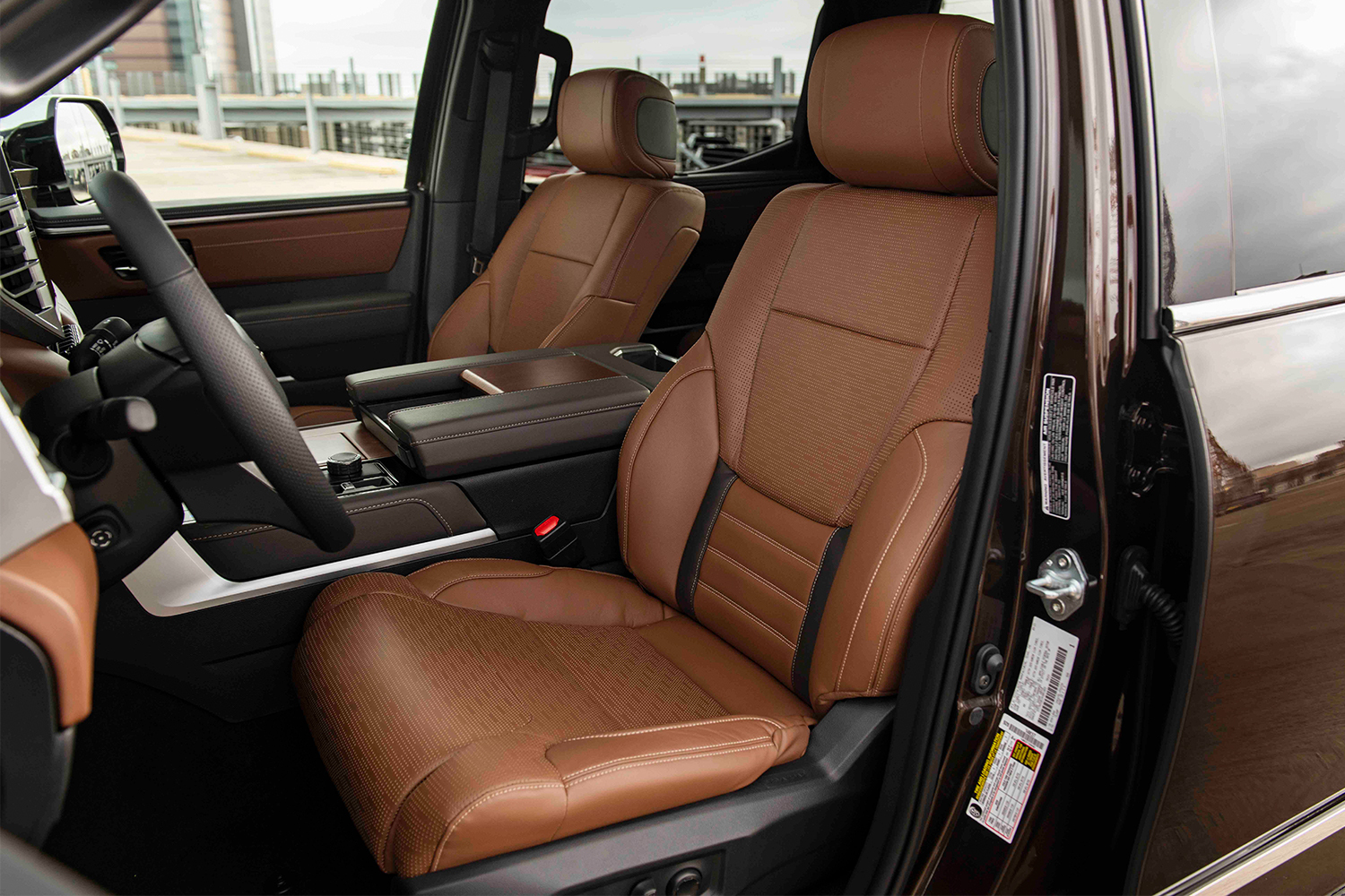 The front seats of a 2022 Toyota Tundra 1794 Edition in smoked mesquite brown