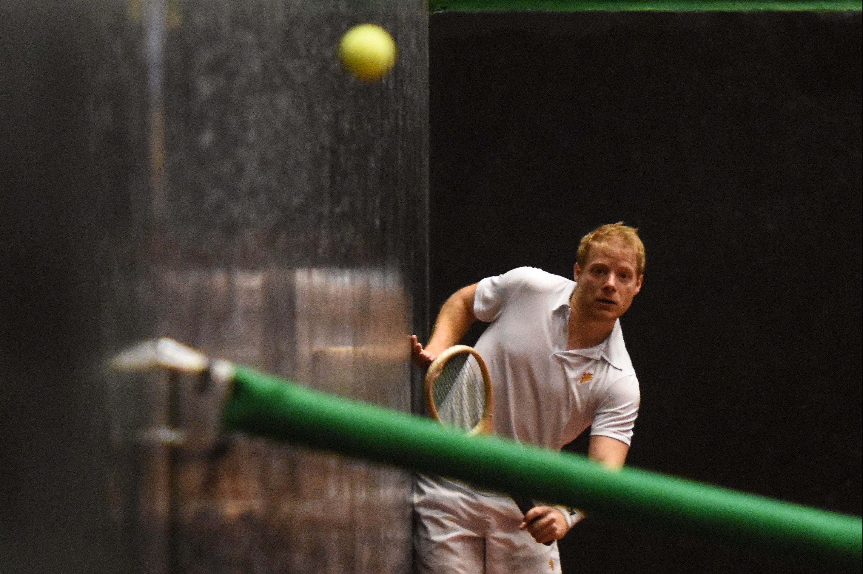 Court tennis star Camden Riviere plays a shot.