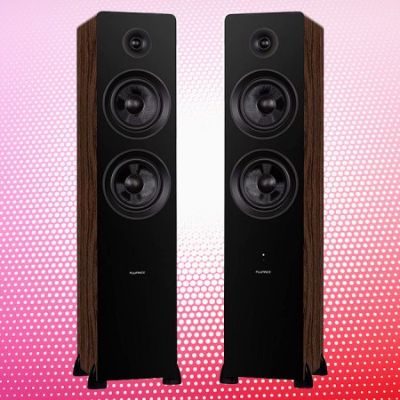 A pair of black and walnut ai81 standing tower speakers from Fluance on a multi-colored red and pink dot background