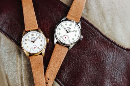 two watches on a leather jacket from Oris