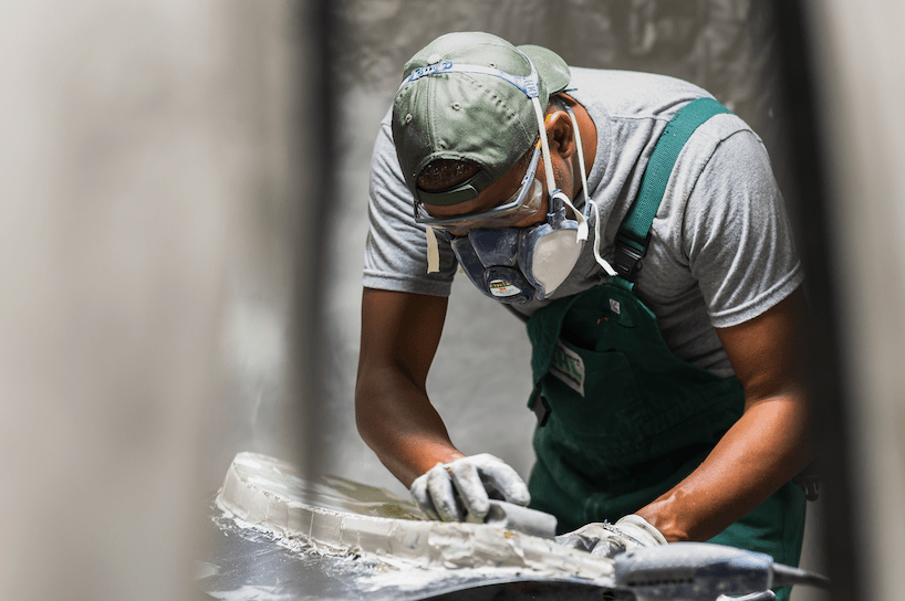 Johans Lamic's in a hat and face mask, working on the Carrera Whale Tail