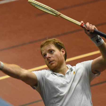 Court tennis star Camden Riviere plays a shot.