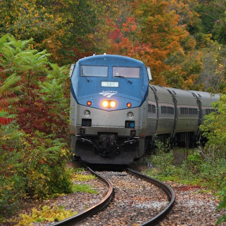 An Amtrak train on the Ethan Allen Express Line headed to Vermont from NYC in the fall. A new route goes all the way to Burlington from Penn Station.