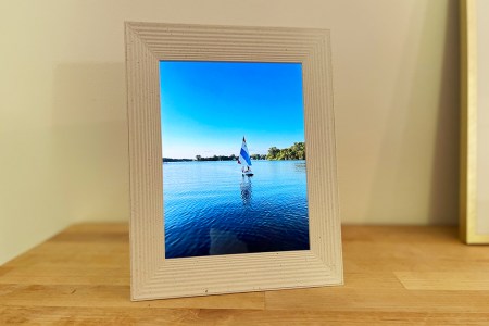 A pictures of a sailboat in a digital photo frame from Aura Frames