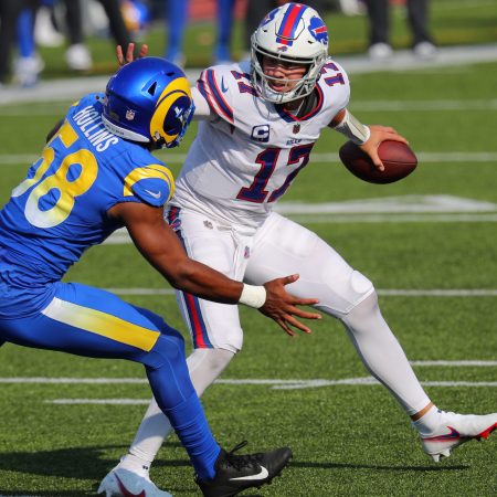 Josh Allen of the Bills evades Justin Hollins of the Rams during a 2020 game.