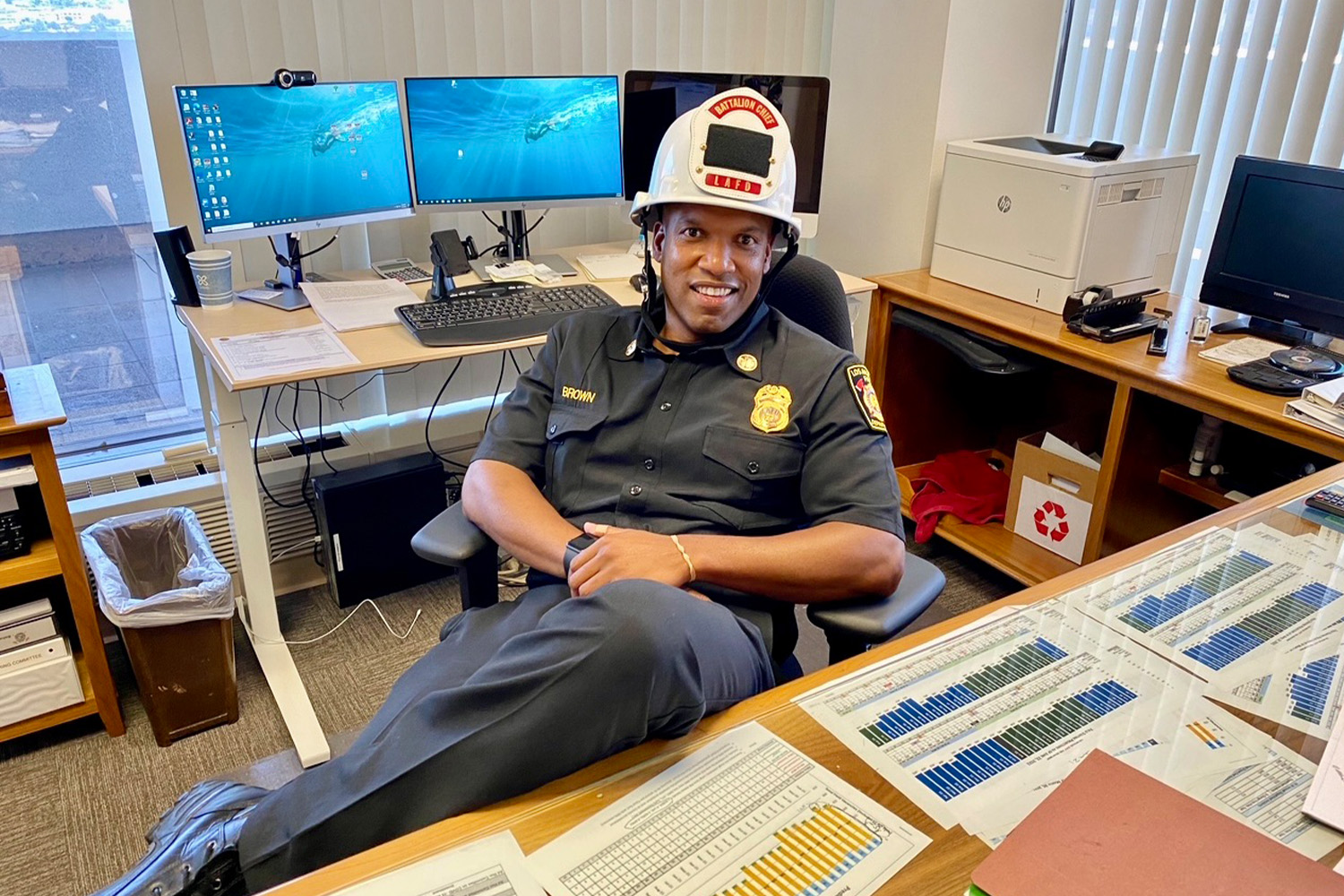 Battalion Chief Brown at his desk