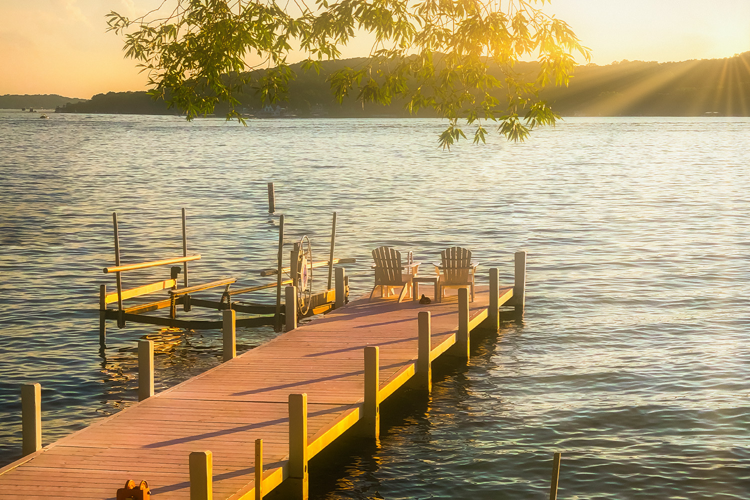 Lake Geneva Pier with Chairs at Sunset