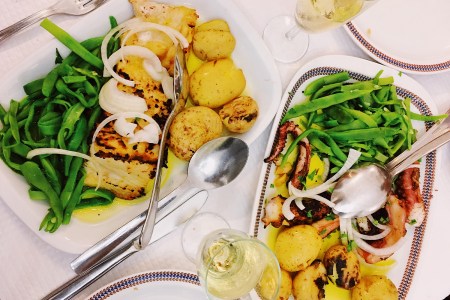 Traditional Portuguese food - bacalhau (dried cod), octopus, potato and green peas