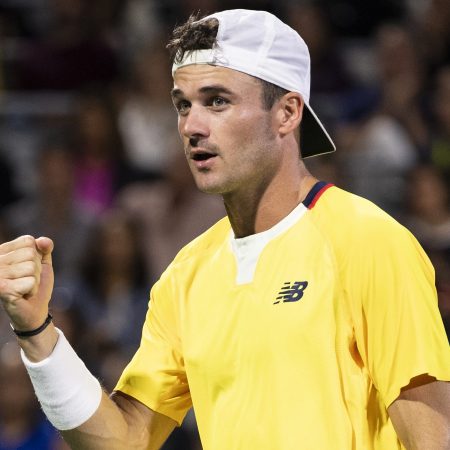 Tommy Paul of the United States celebrates winning a point.