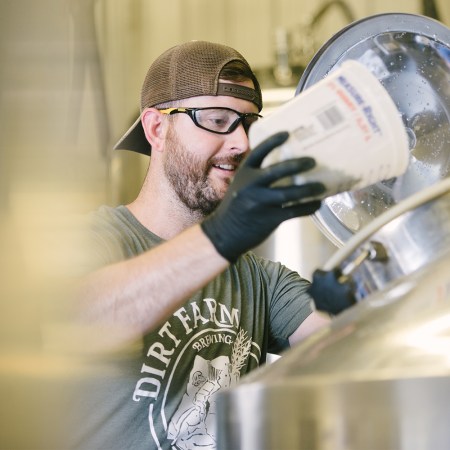 Wes Schoeb, the head brewer at Dirt Farm Brewing, making beer at the DC brewery