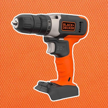 A drill from Black & Decker being used on a table. Tools from B&D are currently on sale at Woot.