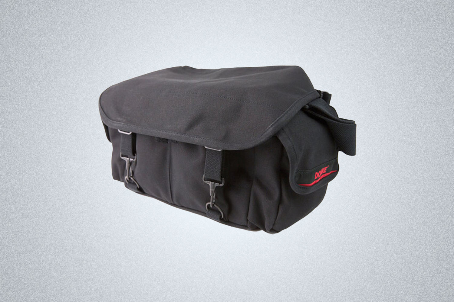 A Domke Camera Shoulder Bag on a gray background