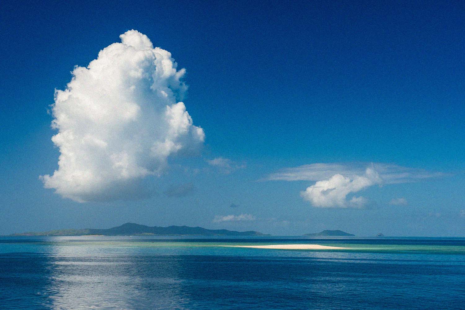 Sandbank in the flat ocean, Mamanuca Islands