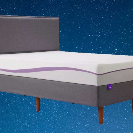 A Purple mattress on a starry blue sky background, now on sale for Labor Day