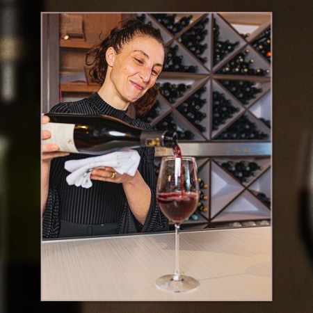 Sommelier Allegra Angelo on Vinya in Miami pours a bottle of wine. She recommends five bottles for you to try.