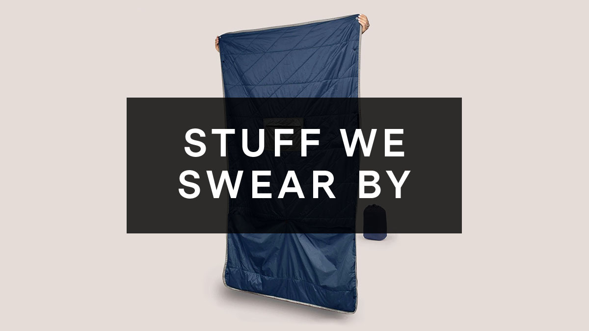 Gravel's Layover Travel Blanket with "Stuff We Swear By" superimposed on top.