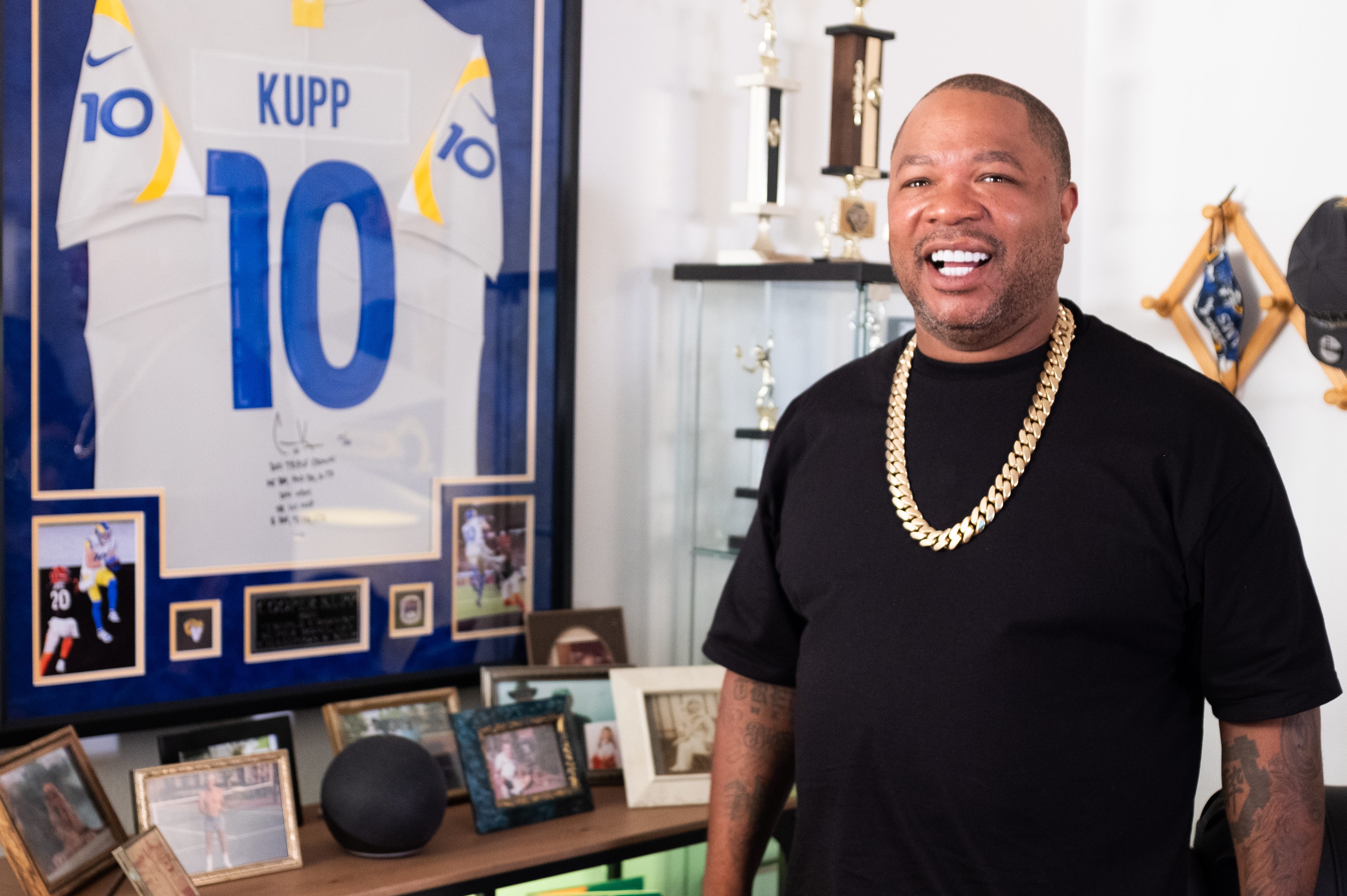 Xzibit inside a fan cave for an elderly Rams fan.