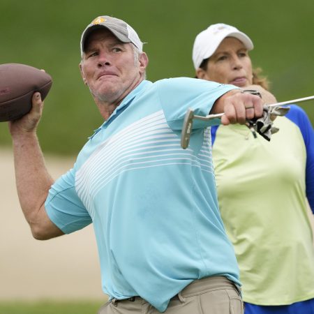 Ex-NFL player Brett Favre throws a football at the American Family Insurance Championship. His welfare scandal is growing with new information about donations from Favre 4 Hope.