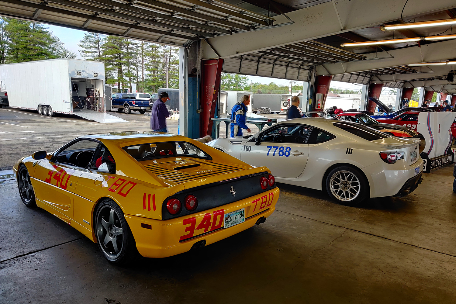 The COMSCC club at Watkins Glen International, including a yellow Ferrari F355