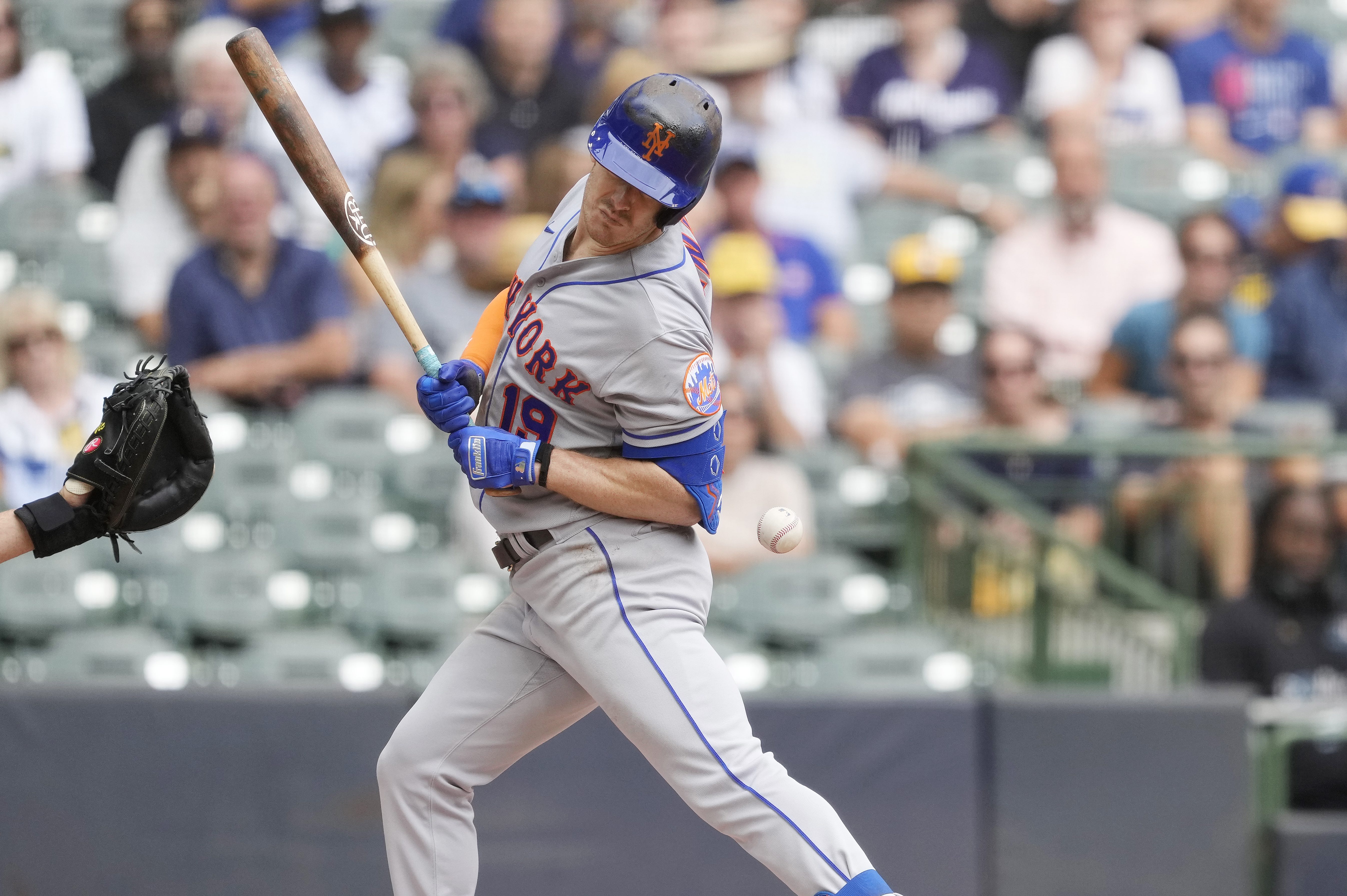 Mark Canha of the New York Mets getting hit by a pitch. The Mets set the modern record for most batsmen hit by pitches in a season.