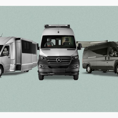 A lineup of Airstream Class B motorhomes, what the RV brand calls touring coaches, including the Atlas, Interstate and Rangeline