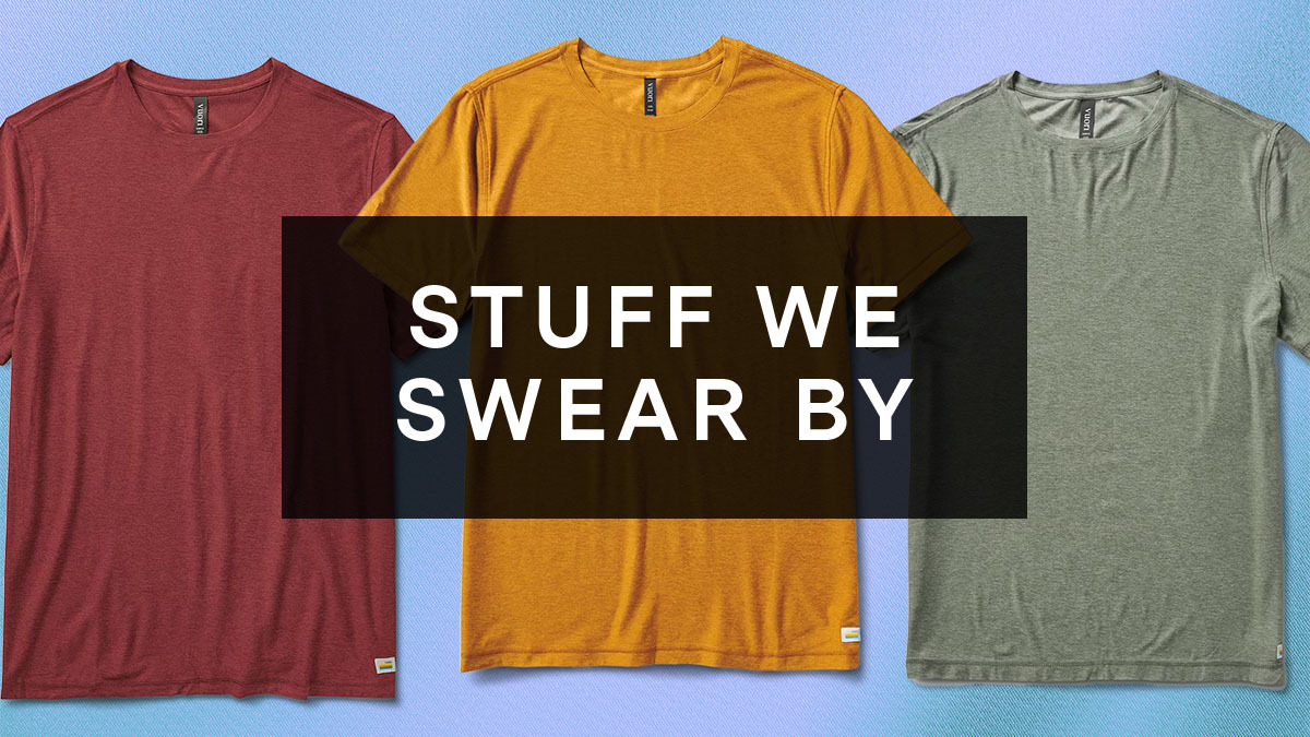 A box with text that reads "STUFF WE SWEAR BY" overlaid on three of Vuori's Strato Tech Tee