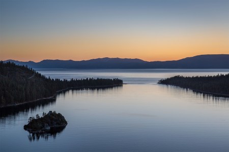 Sunrise over Lake Tahoe's Emerald Bay, one of the best places to hike in the fall