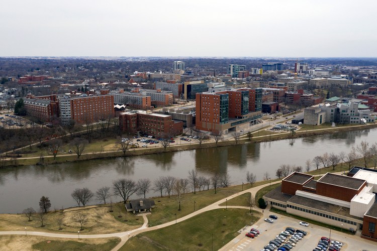 The college town of Iowas City is pictured here behind the Iowa River