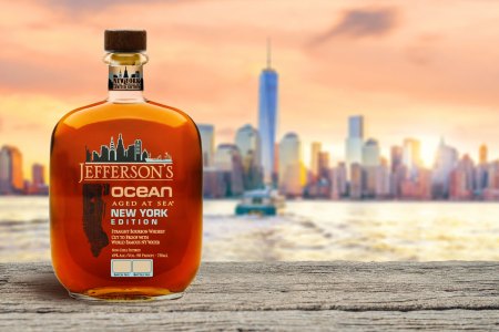 A bottle of Jefferson's Ocean Aged at Sea New York Edition, against an NYC backdrop