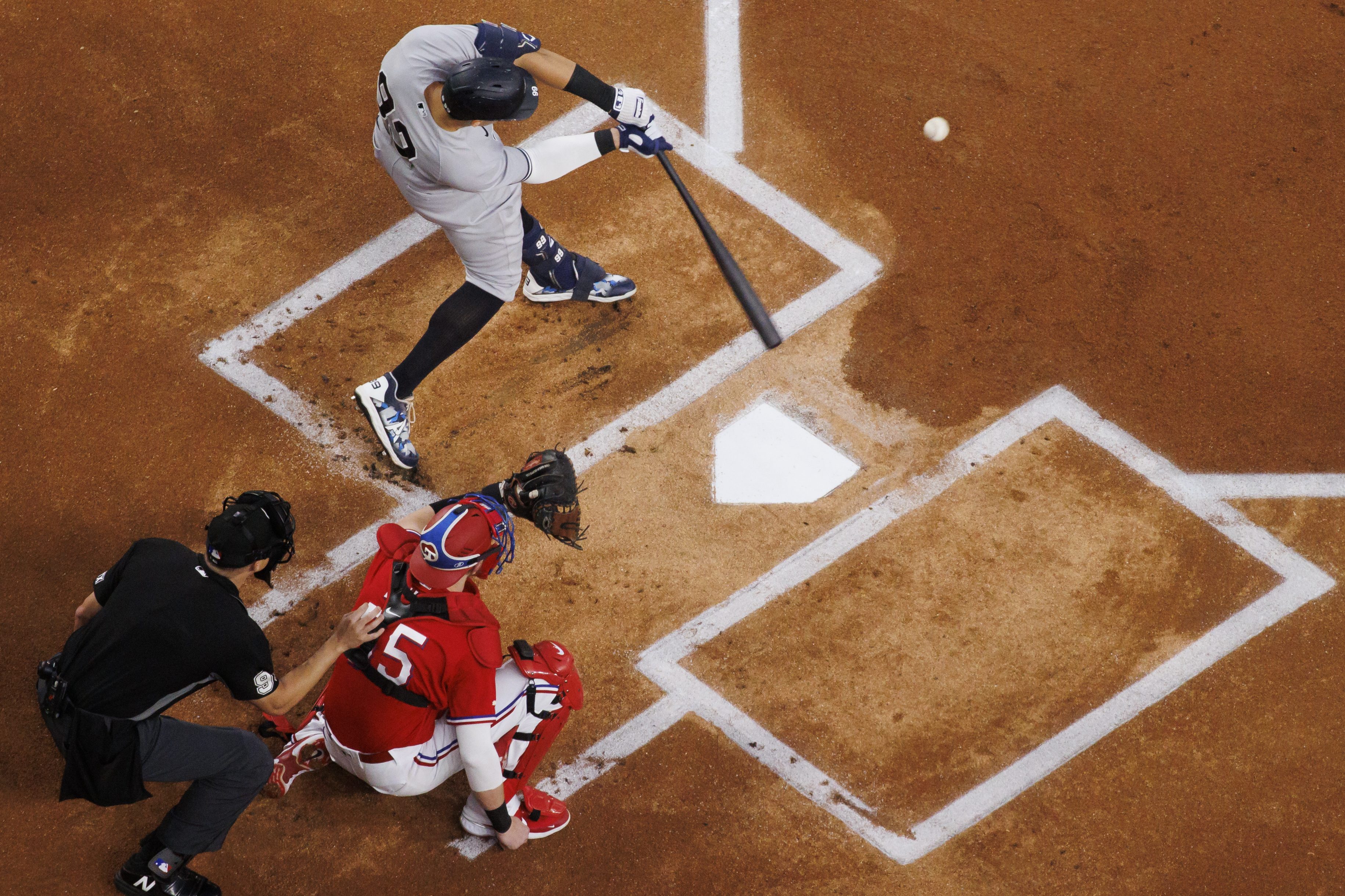 Aaron Judge of the New York Yankees hits his 62nd home run of the season. Cory Youmans is the one who caught it.