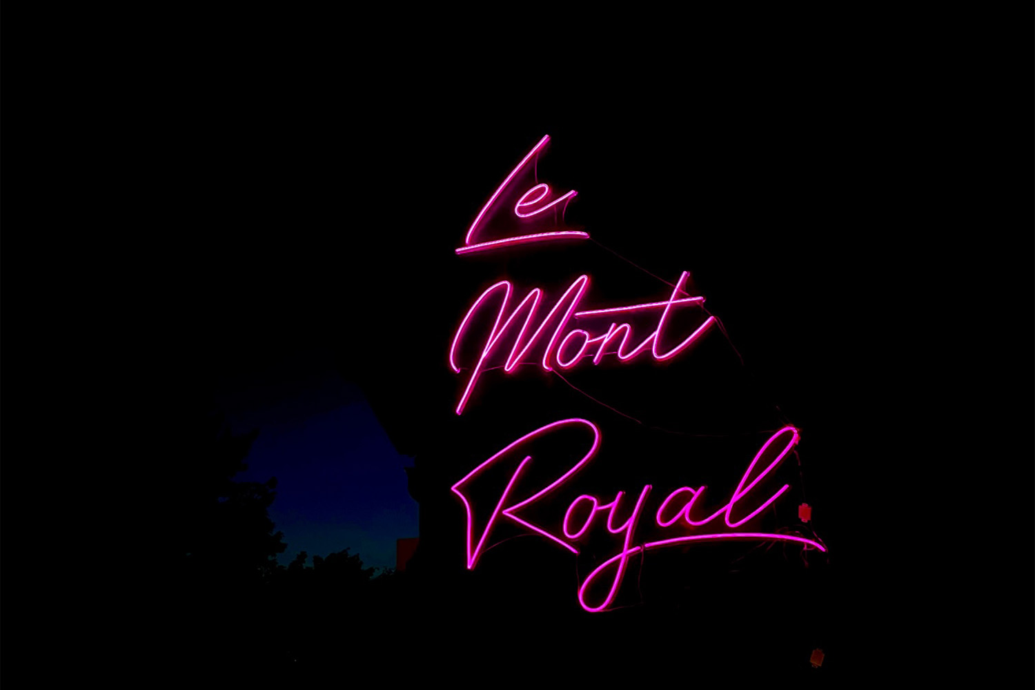 Exterior sign for Le Mont Royal in the Adams Morgan neighborhood in Washington, D.C.