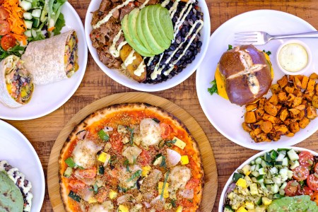 An overhead photo of dishes from Love Life Cafe, a vegan restaurant in Miami that's a favorite of baker Pamela Wasabi